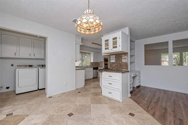 a bathroom with a sink double vanity and a mirror
