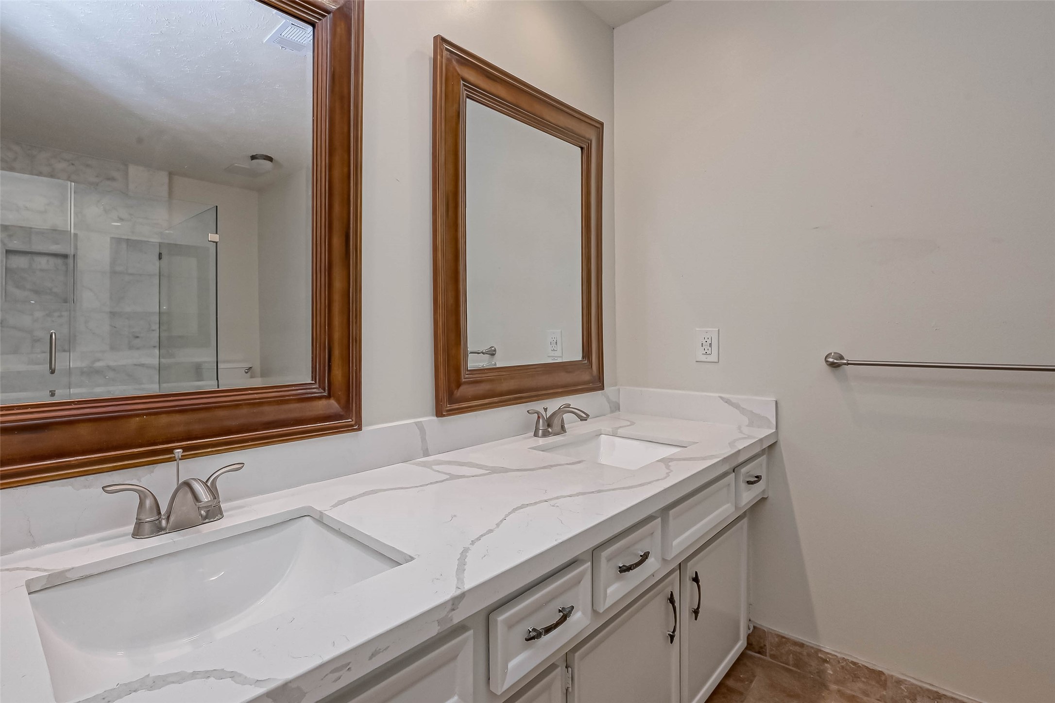 2831 Pecan Ridge Drive Sugar Land, TX 77479 - Photo 27 of 44 a bathroom with a sink and a mirror