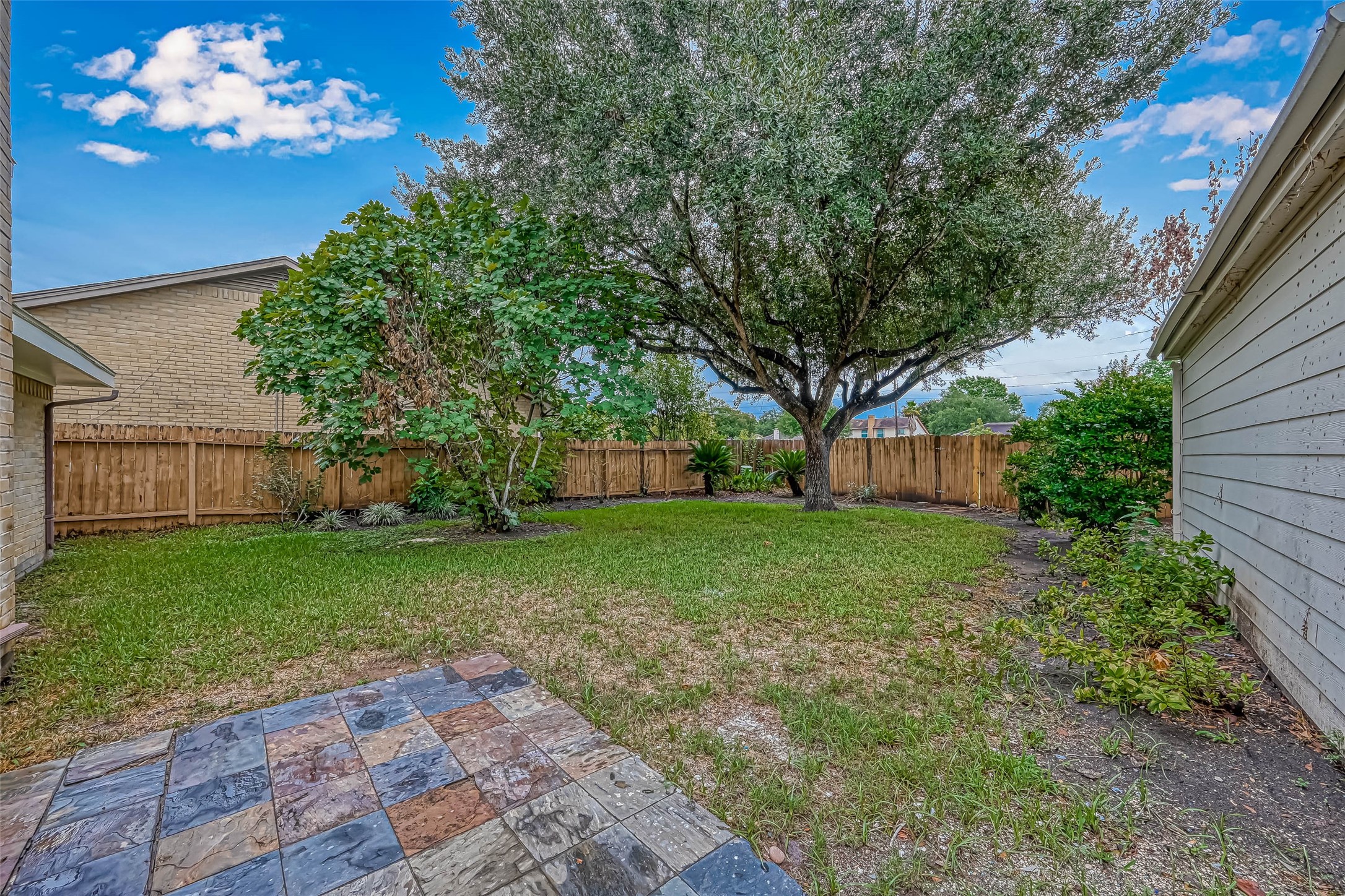 2831 Pecan Ridge Drive Sugar Land, TX 77479 - Photo 40 of 44 a view of a backyard with a garden