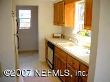 1150 Penman Road Jacksonville Beach, FL 32250 - Photo 7 of 16 a bathroom with a sink and a mirror