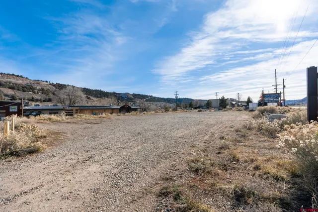 a view of lake with mountain in the background