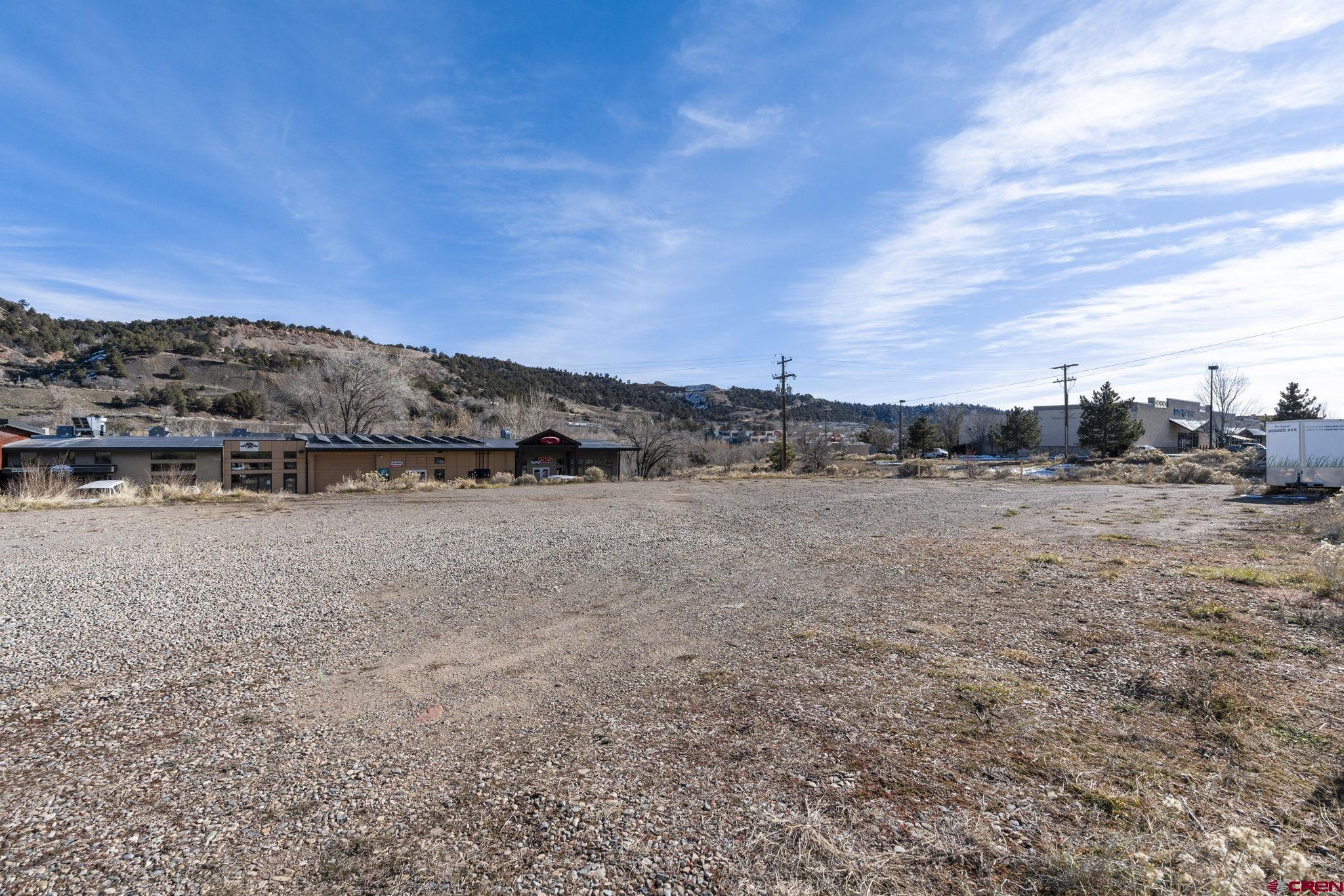 Tbd South Camino Del Rio Durango, CO 81301 - Photo 18 of 26 a view of a dry yard with wooden fence