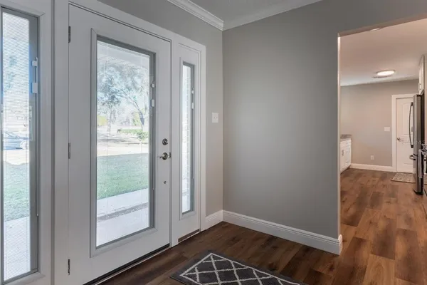 a view of an empty room and window