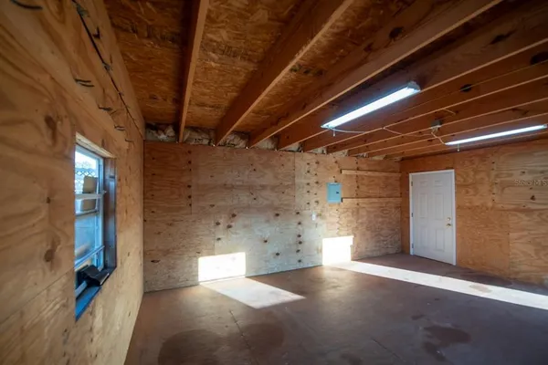 a view of empty room with windows