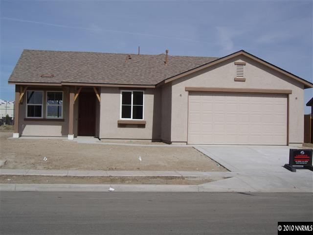 8995 Convair Way Reno, NV 89506 - Photo 1 of 1 a front view of a house with a outdoor space