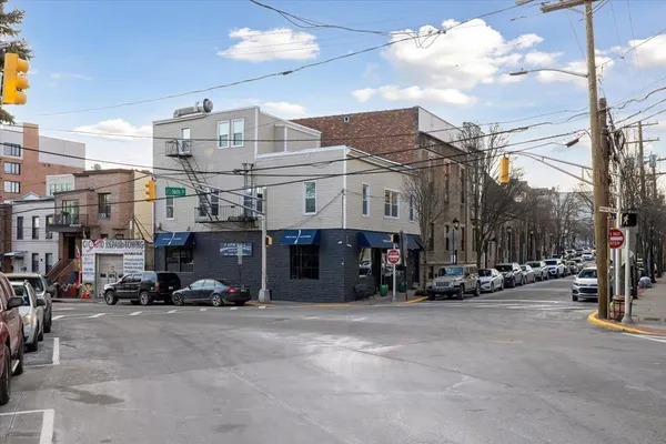 a view of a street with cars