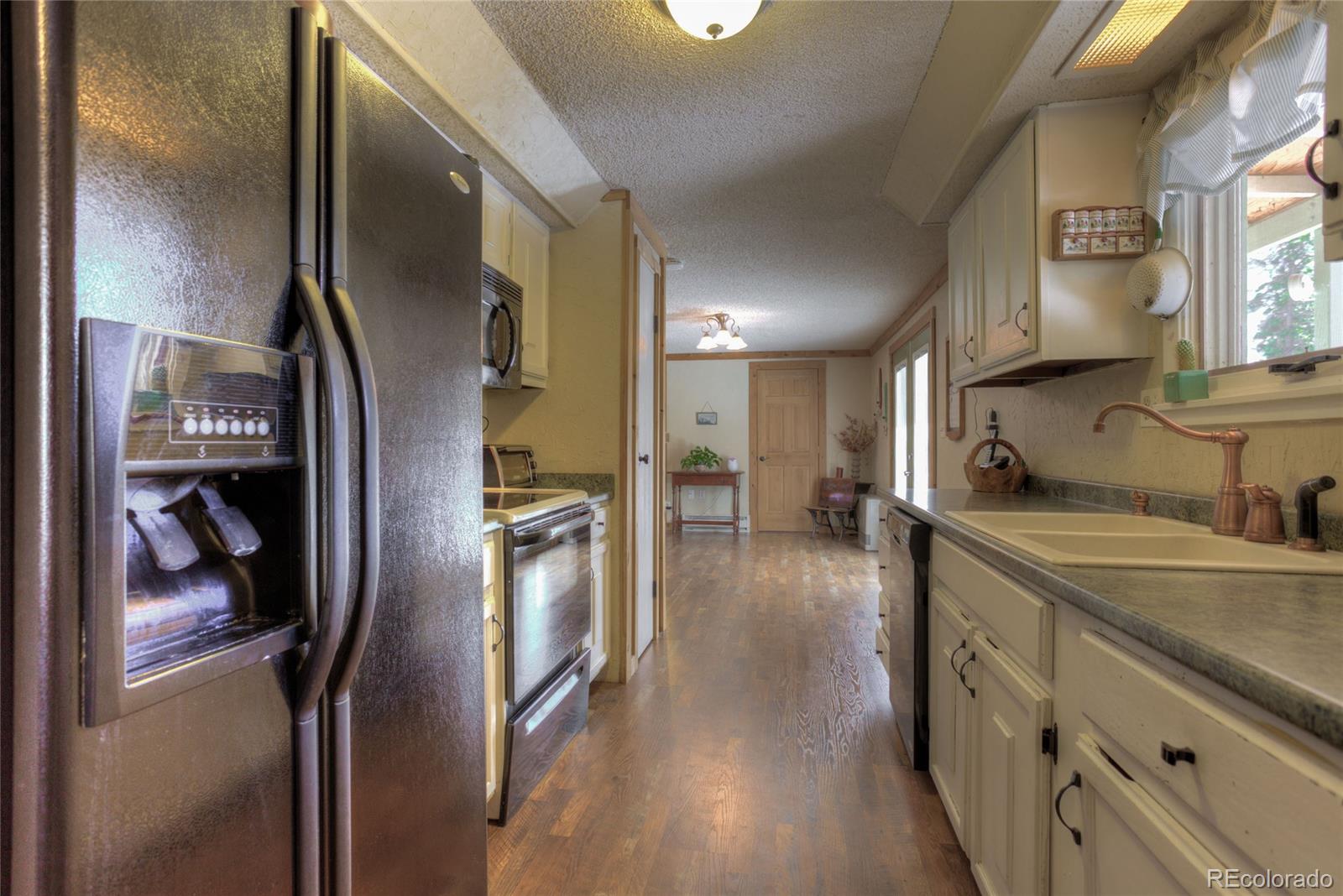 8431 South Warhawk Road Conifer, CO 80433 - Photo 9 of 29 Gallery Image 9