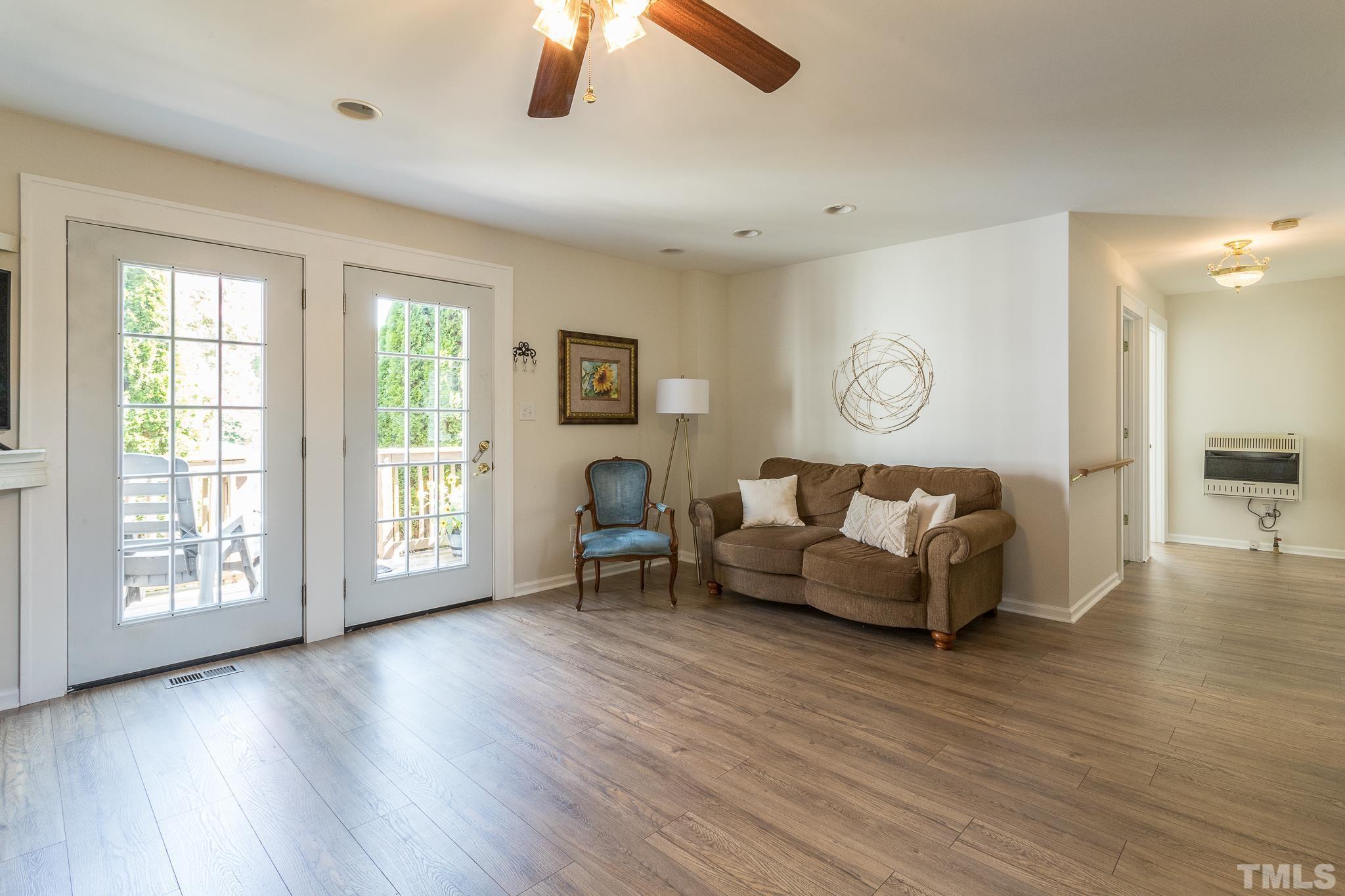 3620 Guess Road Durham, NC 27705 - Photo 16 of 41 a living room with furniture and a large window