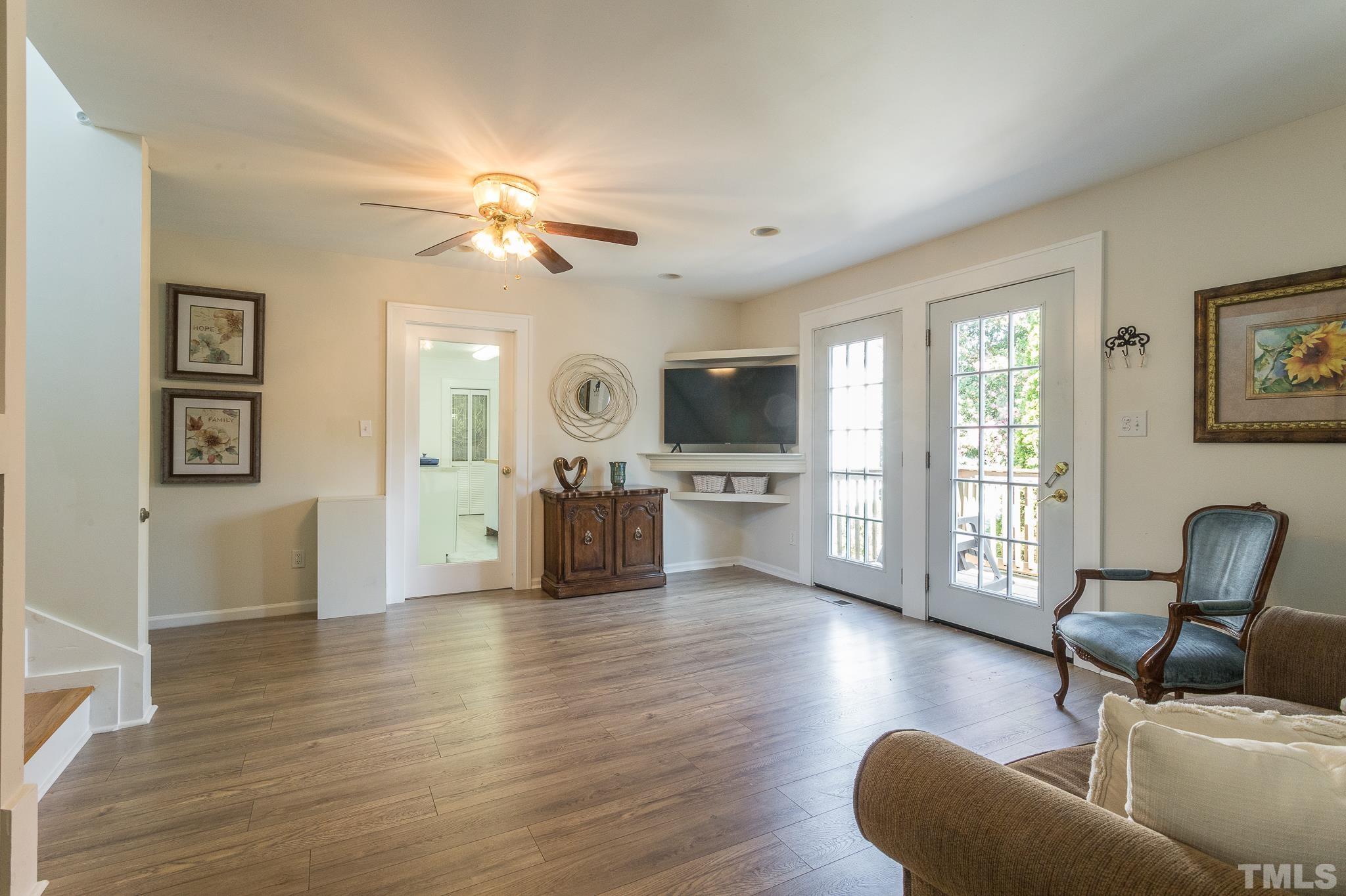 3620 Guess Road Durham, NC 27705 - Photo 17 of 41 a living room with furniture and kitchen view