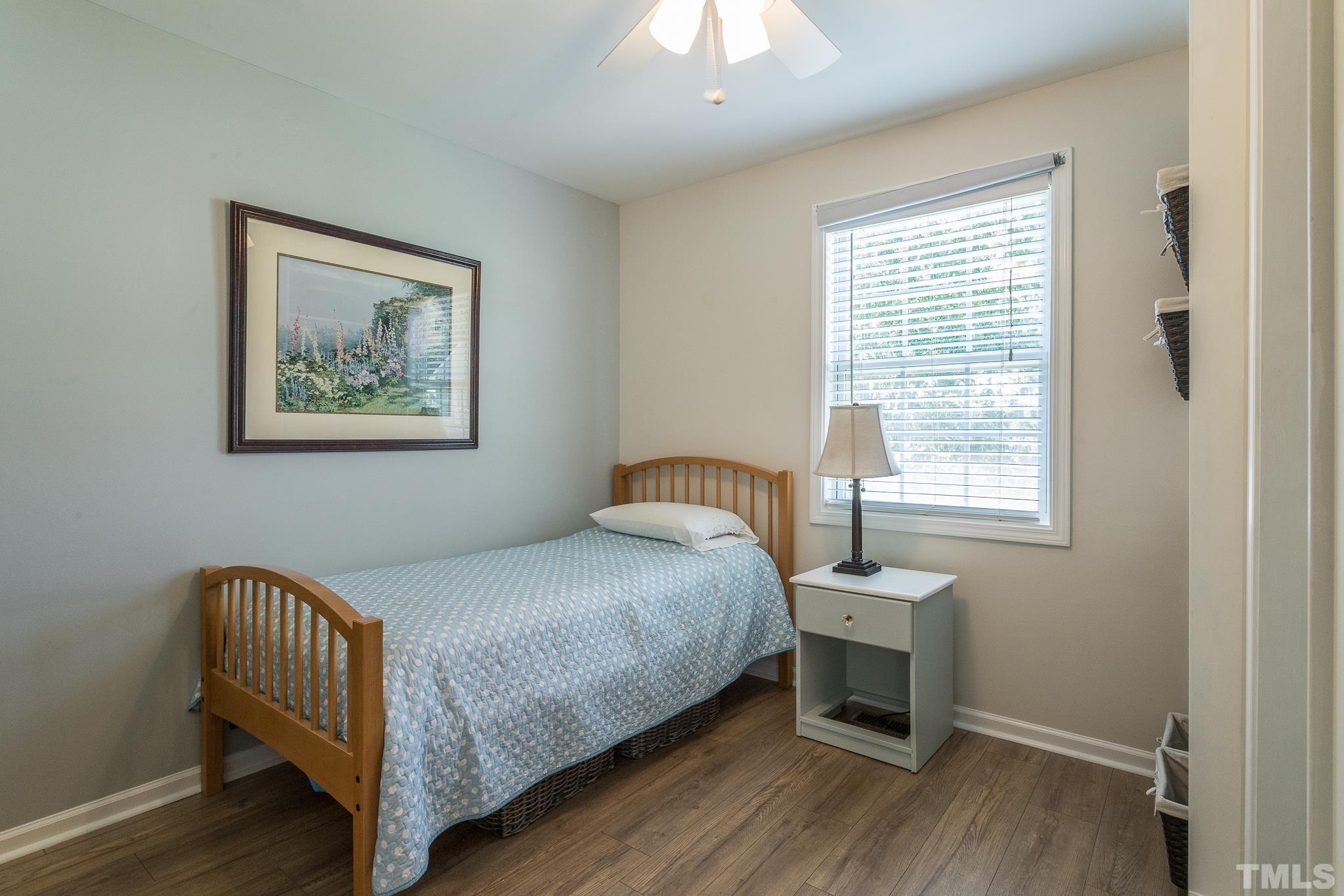 3620 Guess Road Durham, NC 27705 - Photo 20 of 41 a bedroom with a bed and a window