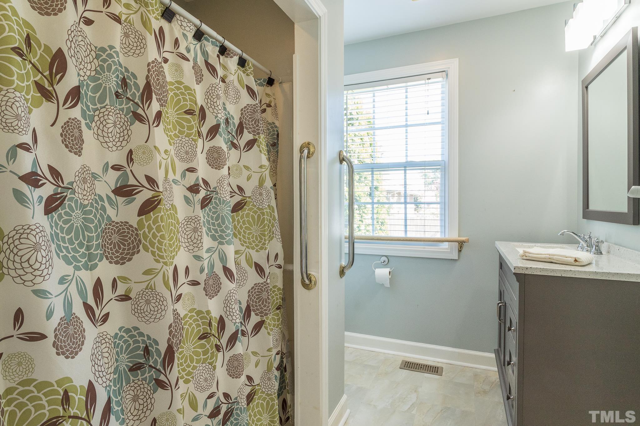 3620 Guess Road Durham, NC 27705 - Photo 21 of 41 a bathroom with a sink and a shower