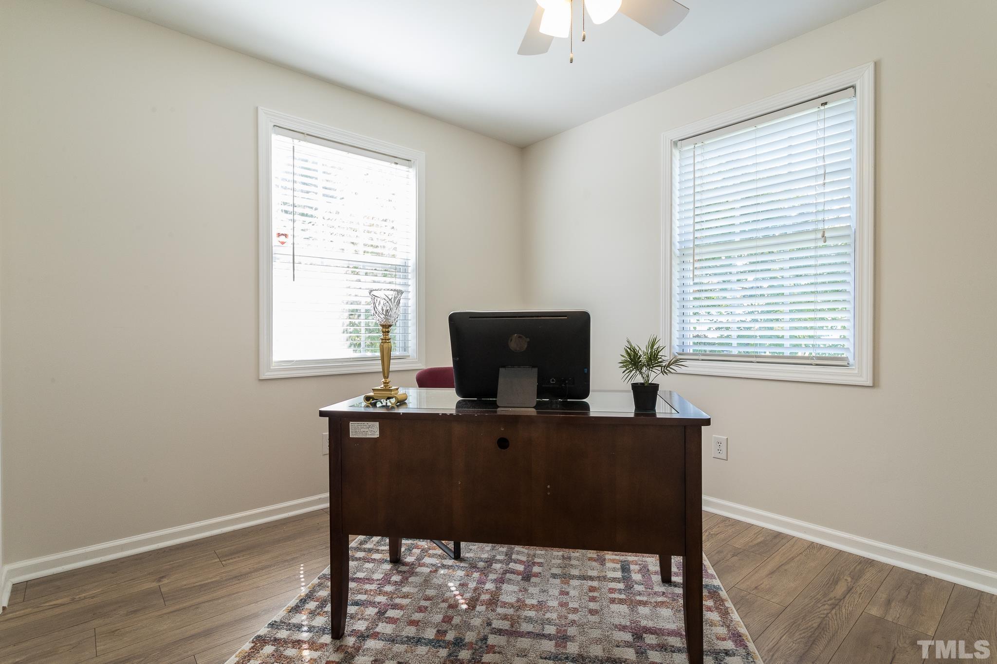 3620 Guess Road Durham, NC 27705 - Photo 23 of 41 a view of a workspace with furniture and a window