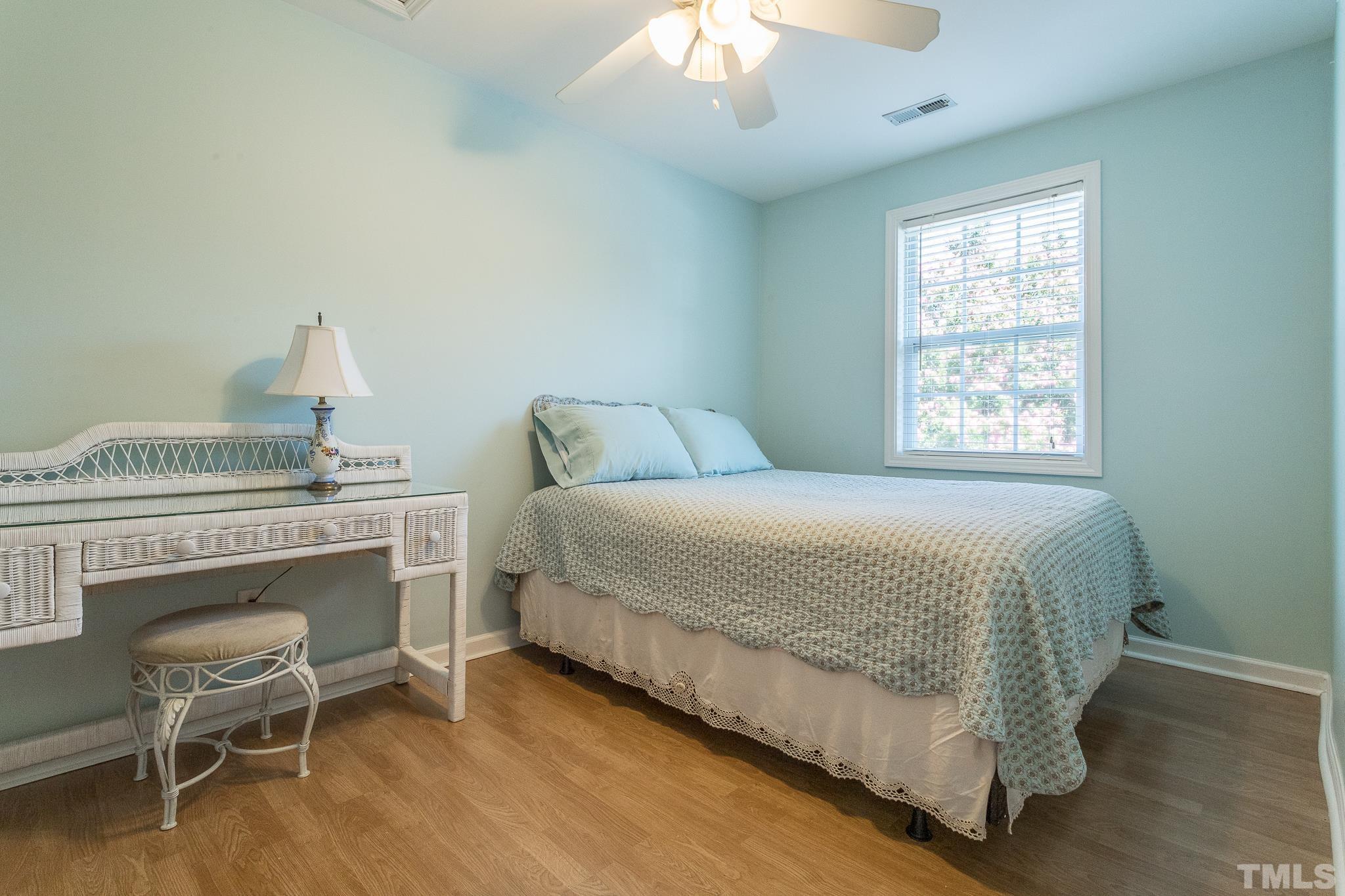 3620 Guess Road Durham, NC 27705 - Photo 25 of 41 a bedroom with a bed and a table chair