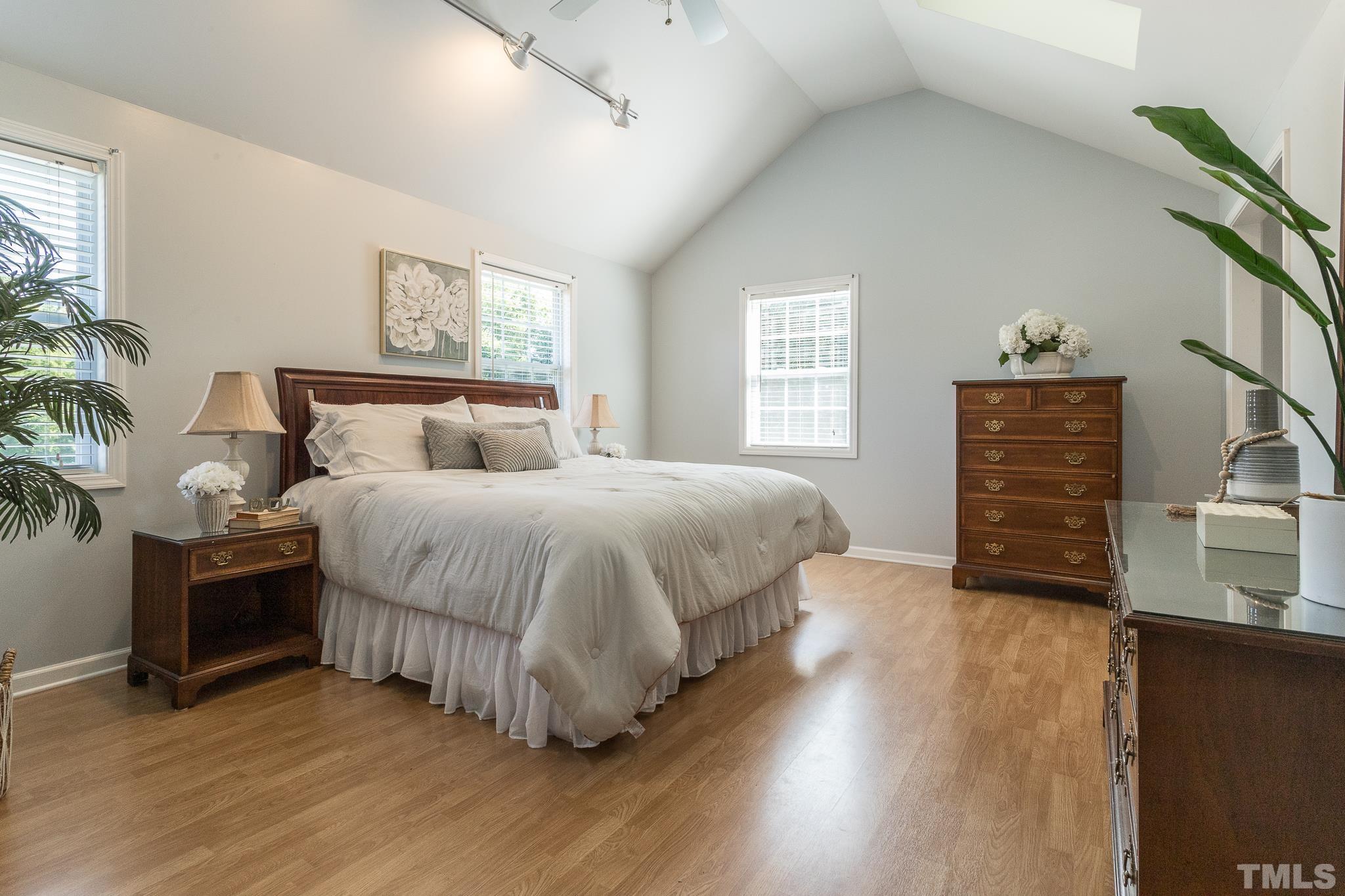 3620 Guess Road Durham, NC 27705 - Photo 27 of 41 a bedroom with a bed and a dresser