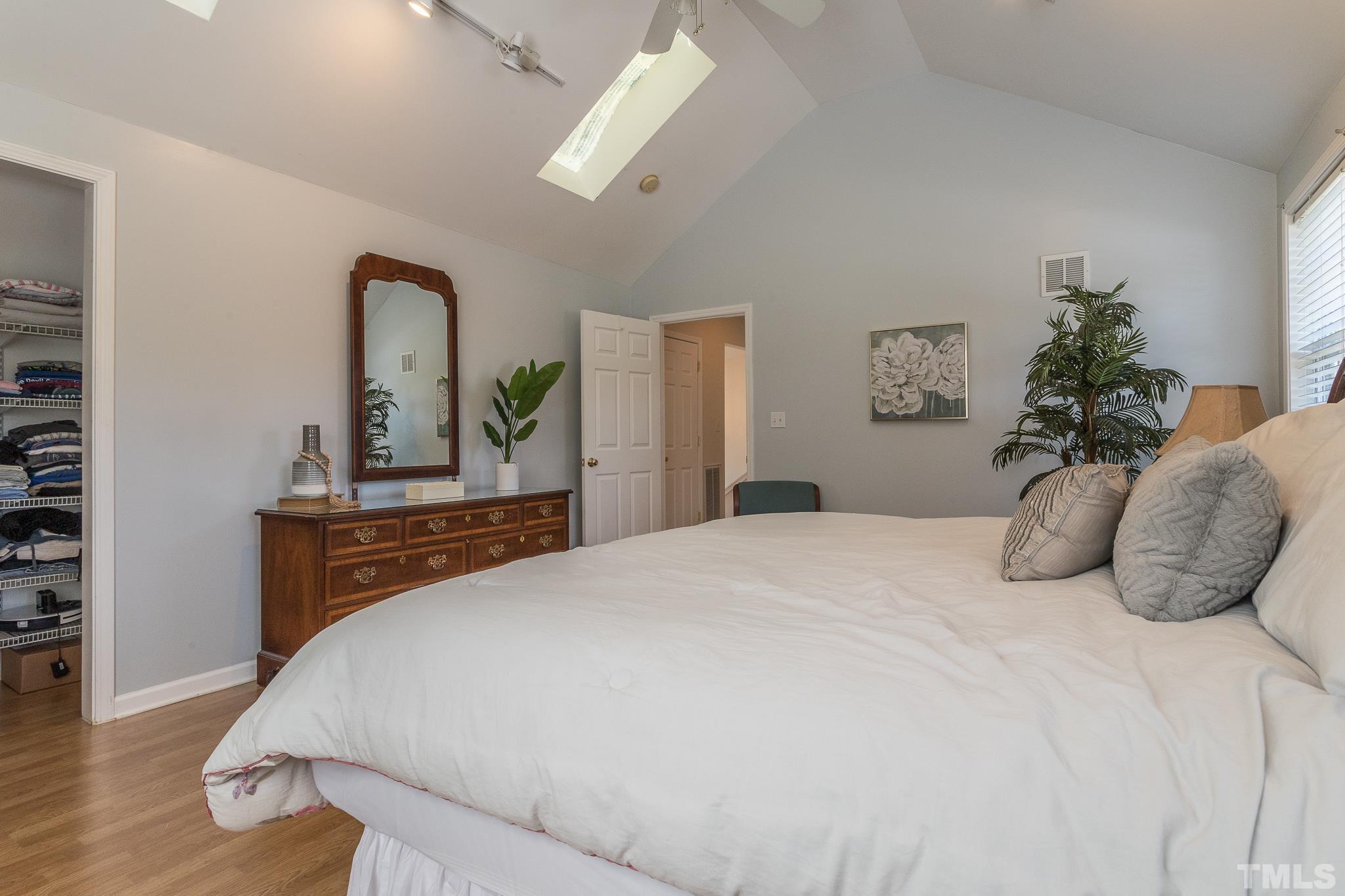 3620 Guess Road Durham, NC 27705 - Photo 28 of 41 a bedroom with a bed and a dresser