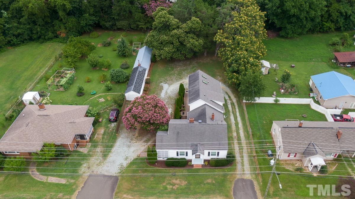 3620 Guess Road Durham, NC 27705 - Photo 38 of 41 an aerial view of a house with a garden and lake view