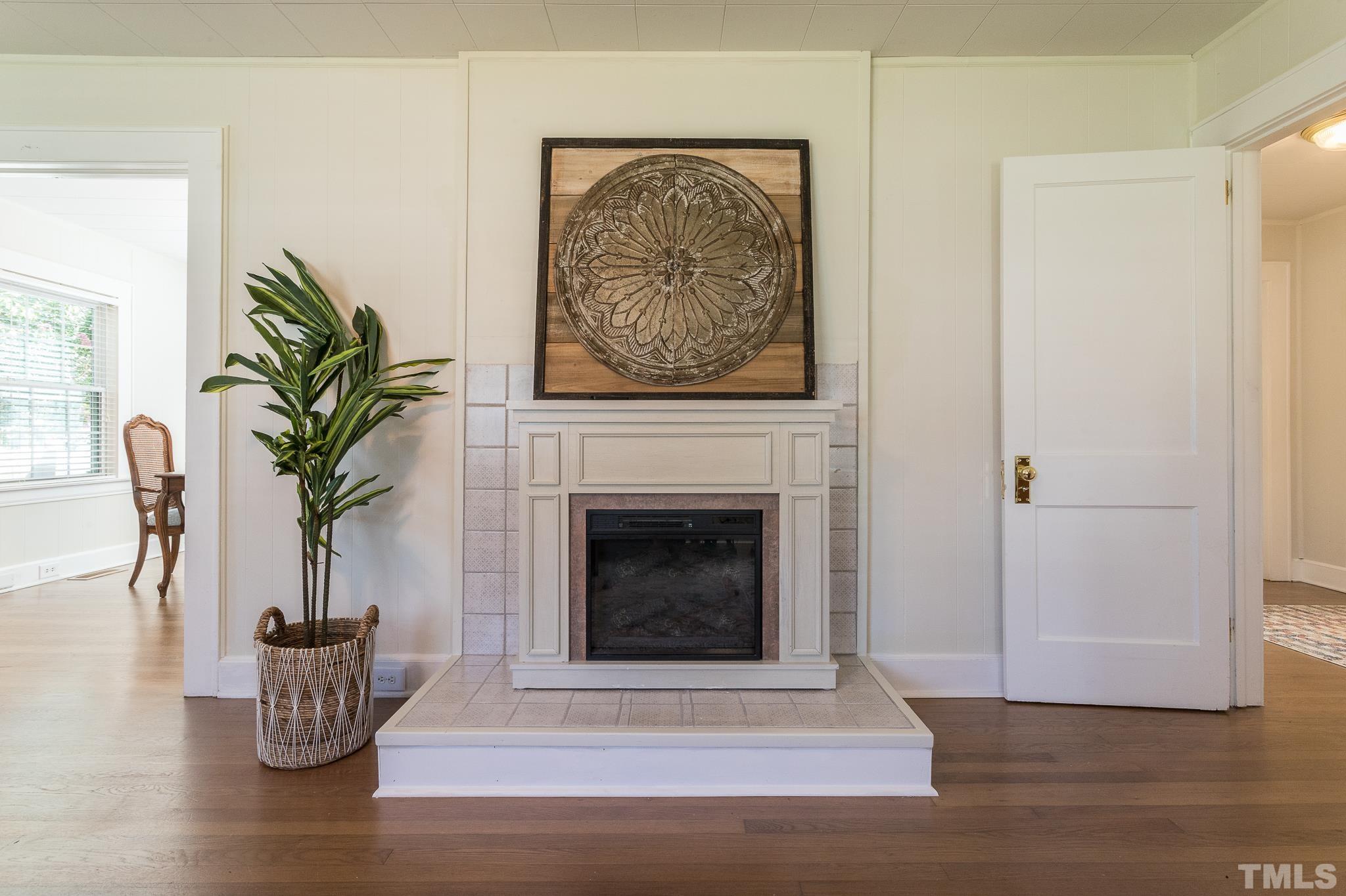 3620 Guess Road Durham, NC 27705 - Photo 6 of 41 a living room with furniture and a fireplace
