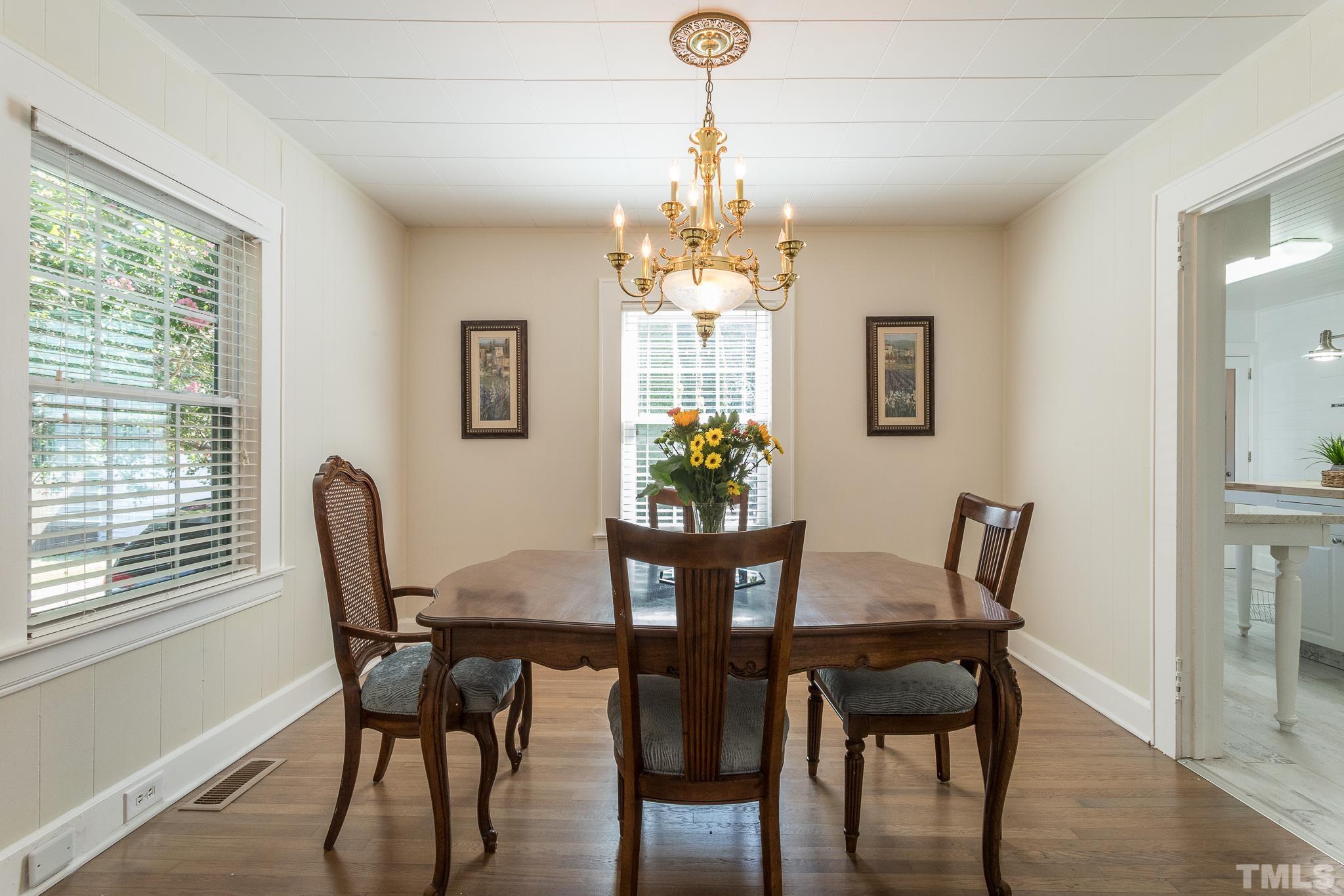 3620 Guess Road Durham, NC 27705 - Photo 8 of 41 a view of a dining room with furniture and window