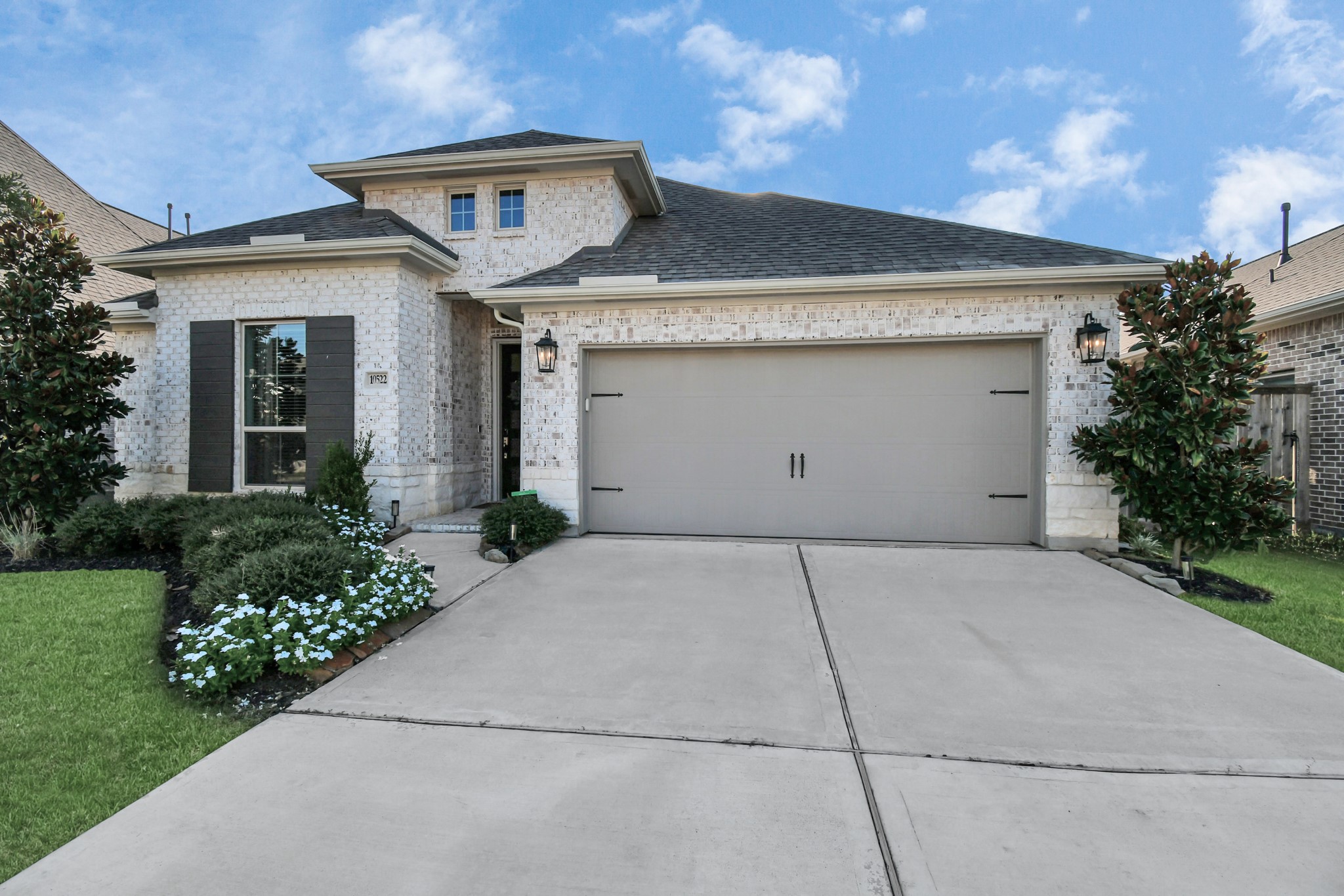 10522 Rigel Rdg Way Richmond, TX 77406 - Photo 2 of 41 a front view of a house with garden