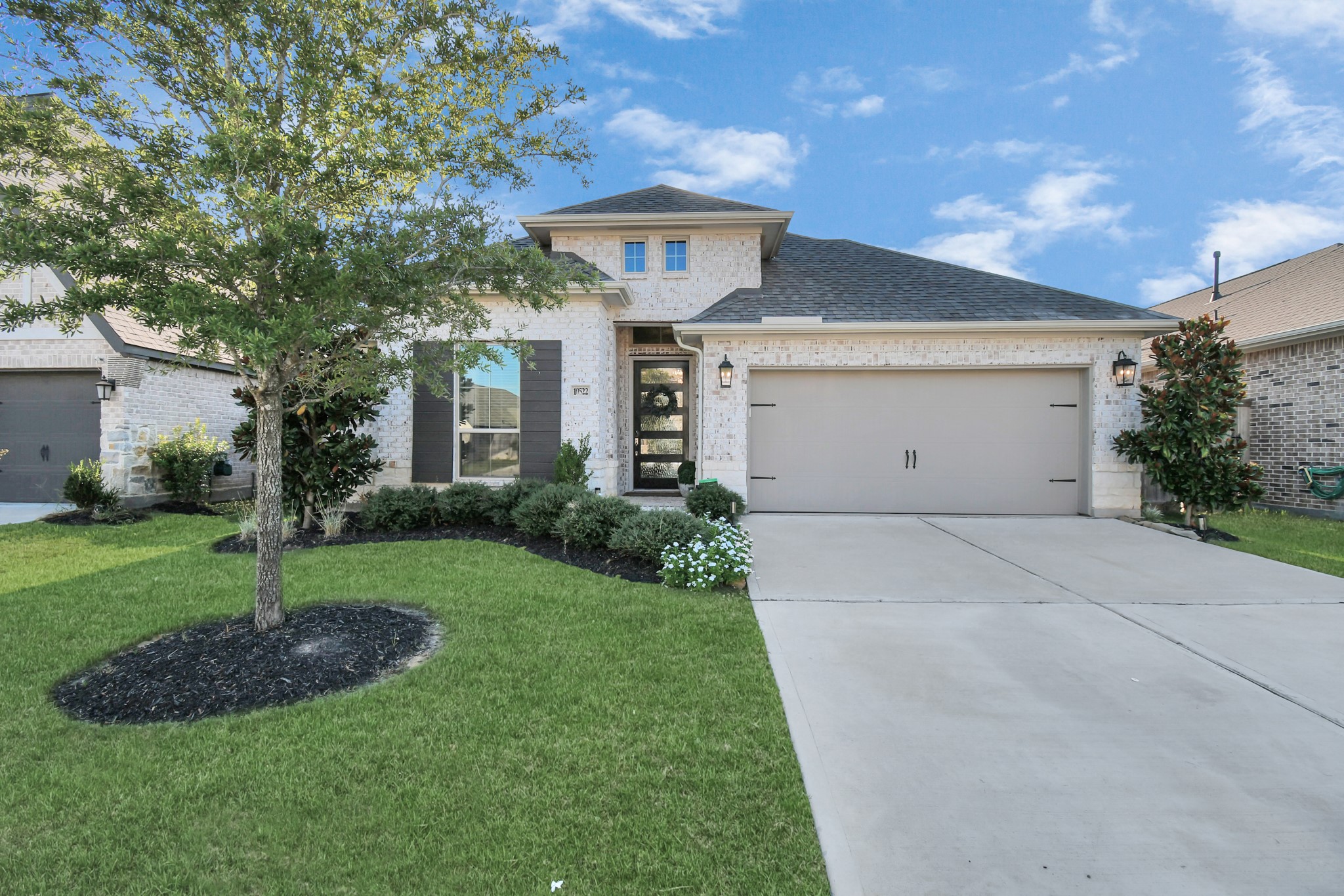 10522 Rigel Rdg Way Richmond, TX 77406 - Photo 3 of 41 a front view of a house with a yard and garage