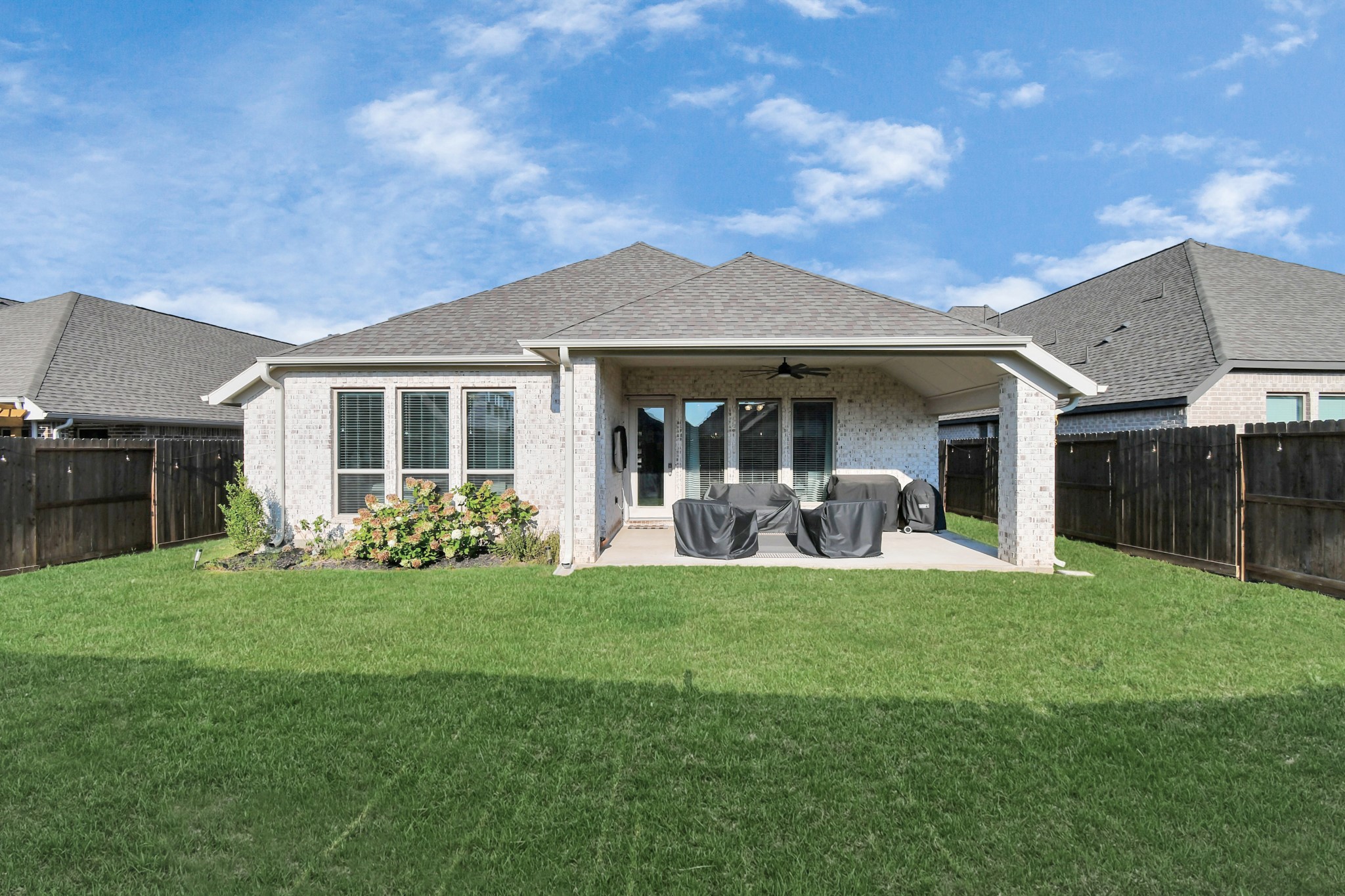 10522 Rigel Rdg Way Richmond, TX 77406 - Photo 31 of 41 a view of a house with a yard and sitting area