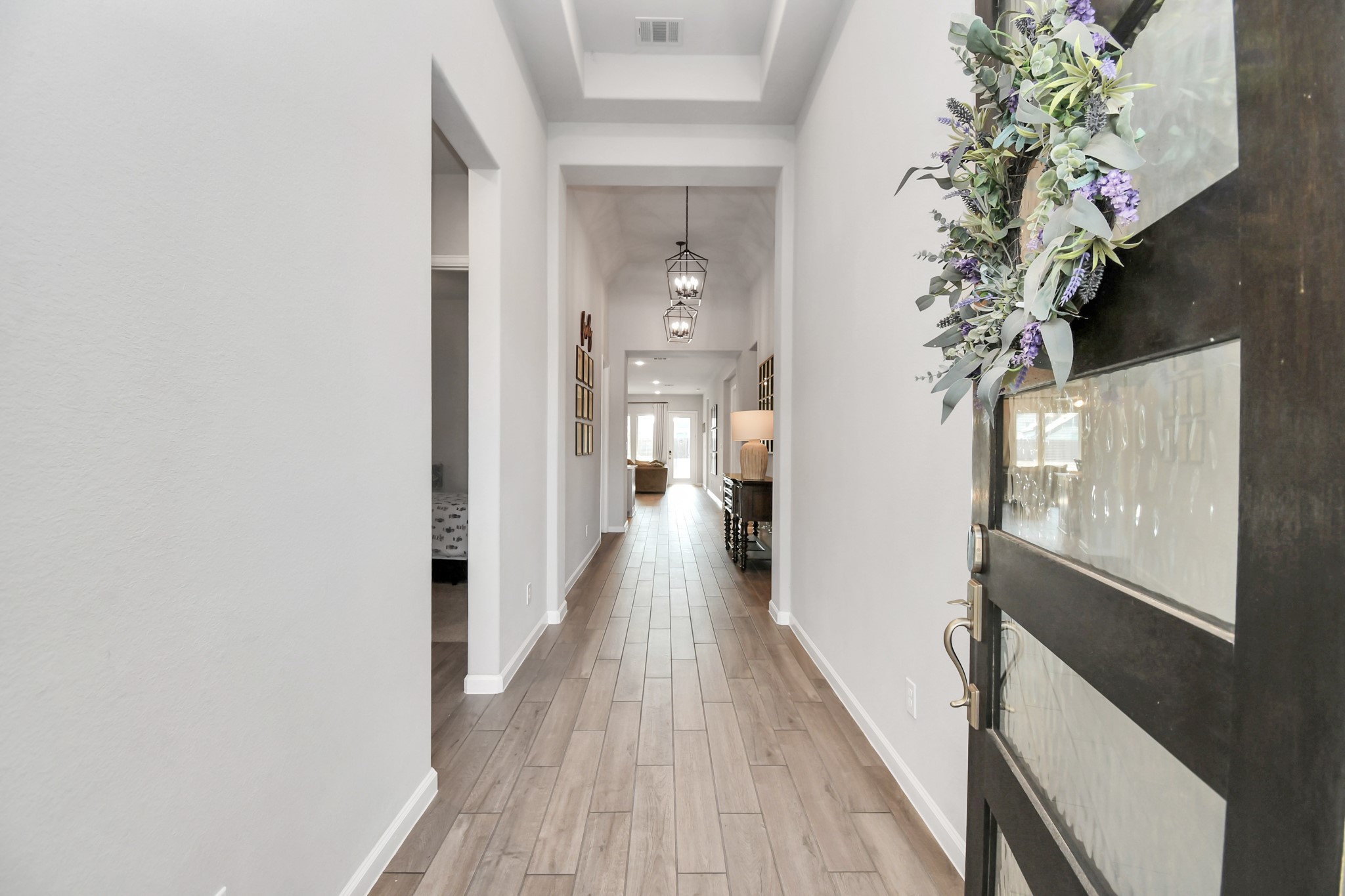 10522 Rigel Rdg Way Richmond, TX 77406 - Photo 5 of 41 a view of a hallway with wooden floor and staircase