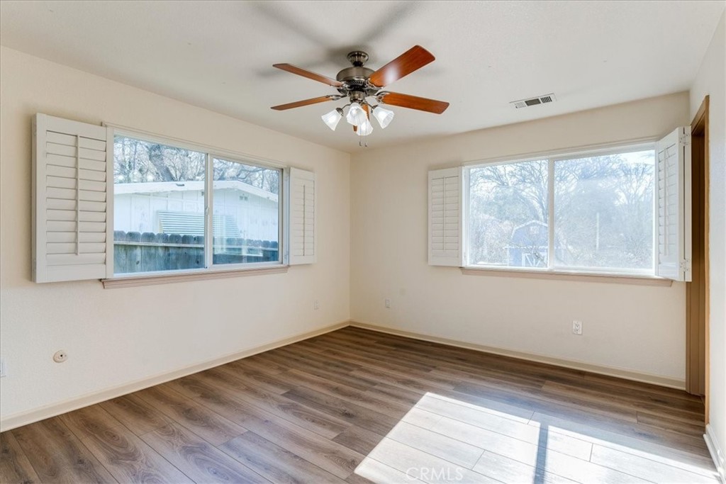 9305 Santa Lucia Road Atascadero, CA 93422 - Photo 15 of 41 a view of an empty room with wooden floor and a window