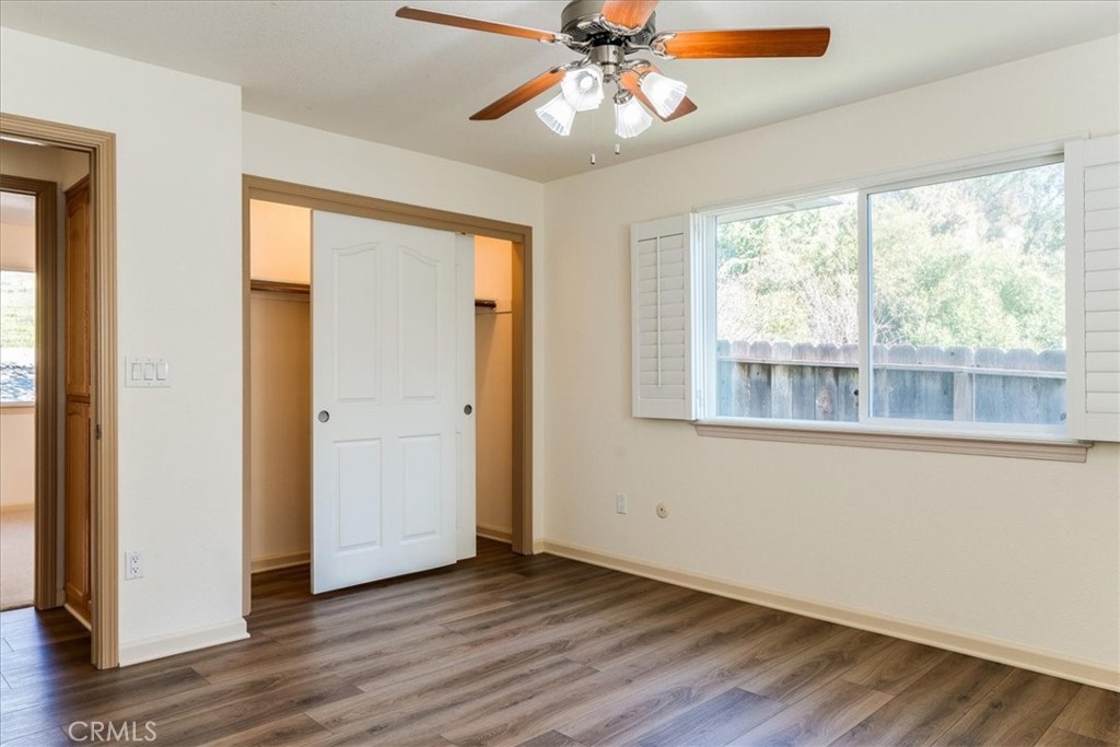 9305 Santa Lucia Road Atascadero, CA 93422 - Photo 17 of 41 a view of an empty room with wooden floor and a window