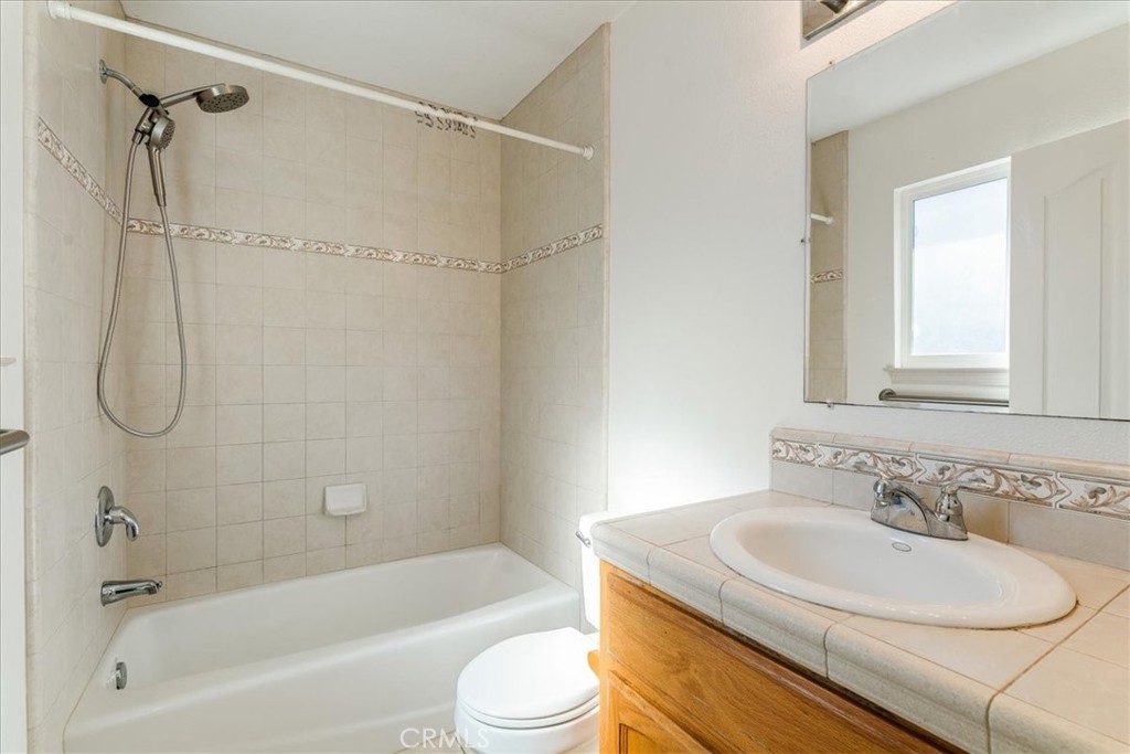 9305 Santa Lucia Road Atascadero, CA 93422 - Photo 18 of 41 a bathroom with a sink toilet and shower