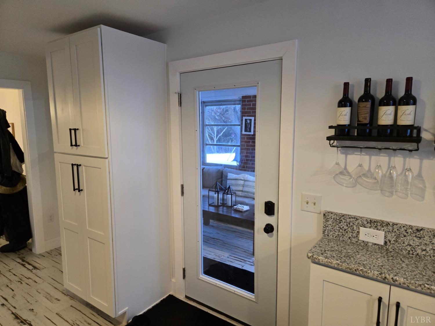 4015 White House Road Moneta, VA 24121 - Photo 18 of 35 a bathroom with a granite countertop sink and a mirror
