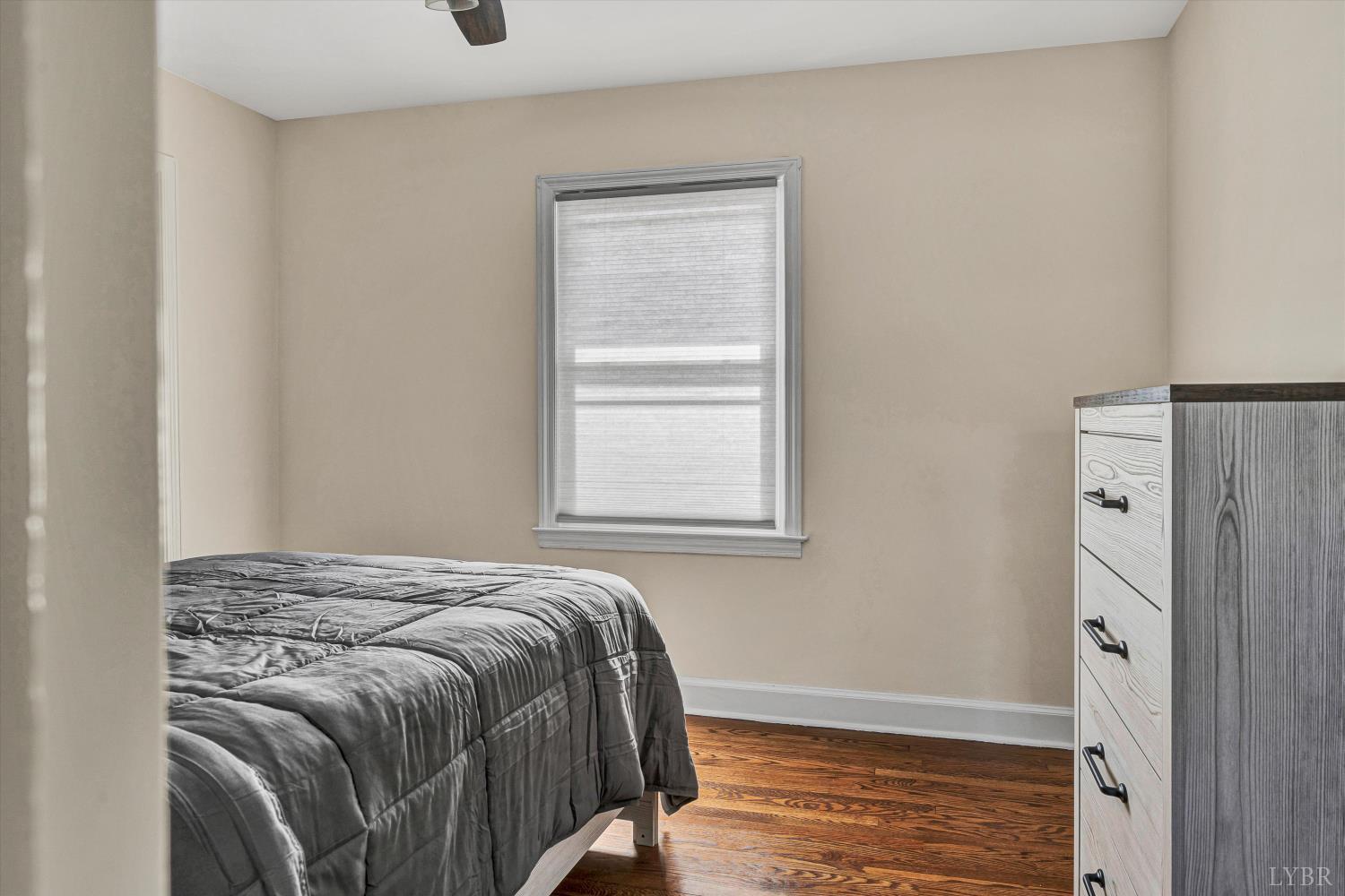 4015 White House Road Moneta, VA 24121 - Photo 23 of 35 a bed sitting in a bedroom next to a window