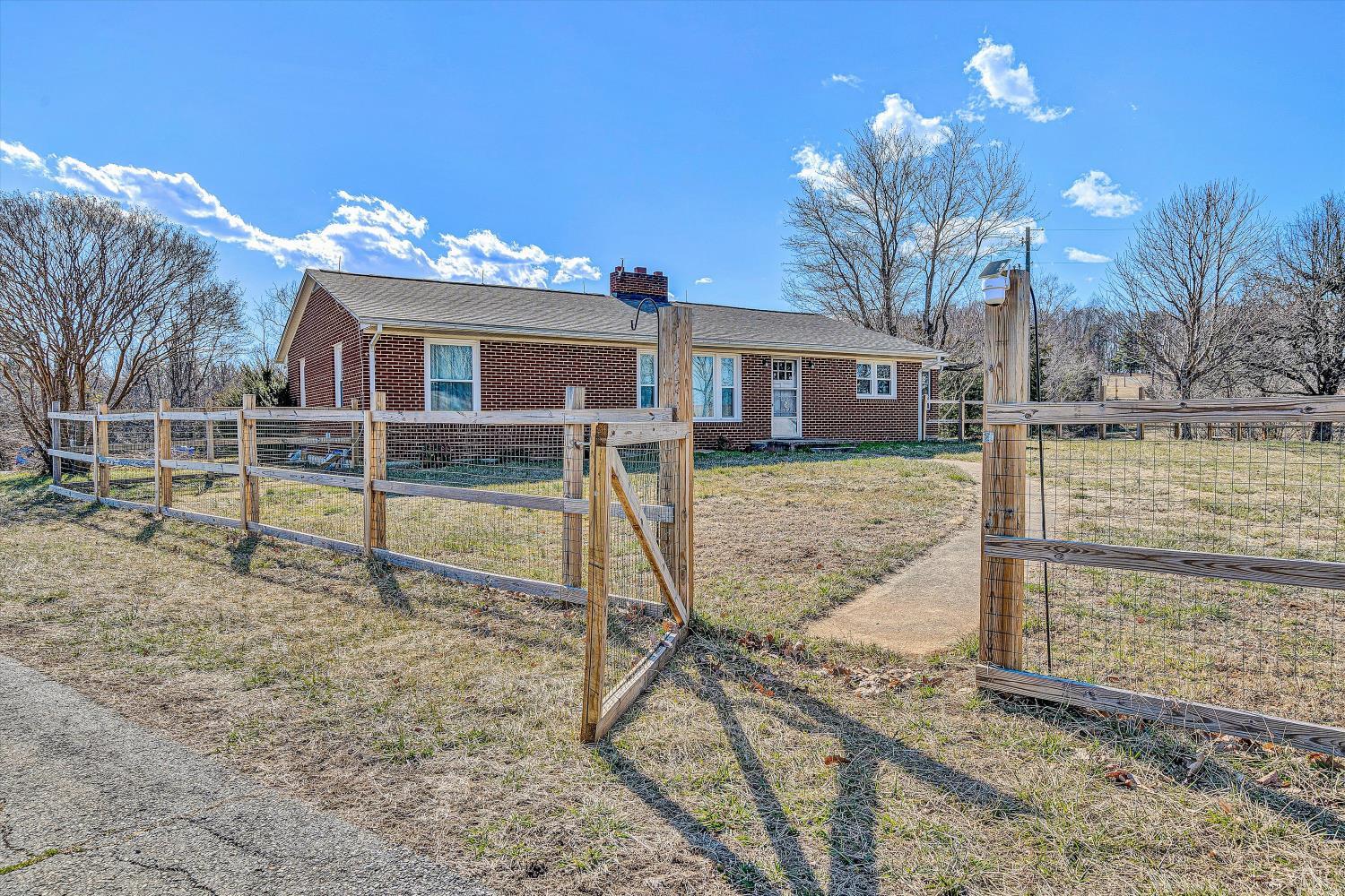 4015 White House Road Moneta, VA 24121 - Photo 4 of 35 a view of a house with a yard