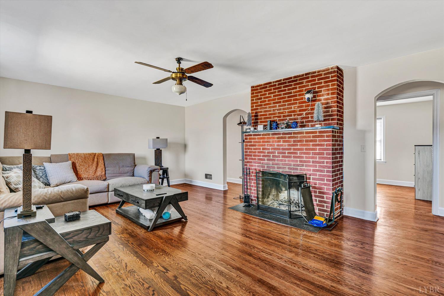 4015 White House Road Moneta, VA 24121 - Photo 7 of 35 a living room with furniture and a fireplace