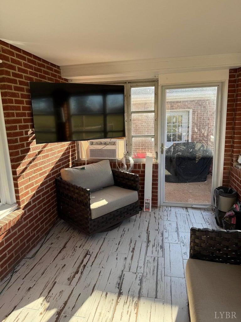 4015 White House Road Moneta, VA 24121 - Photo 8 of 35 a living room with furniture and a flat screen tv