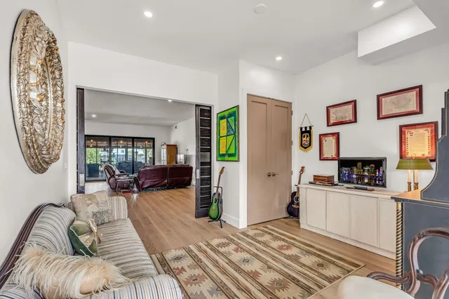 a view of a livingroom with furniture and window
