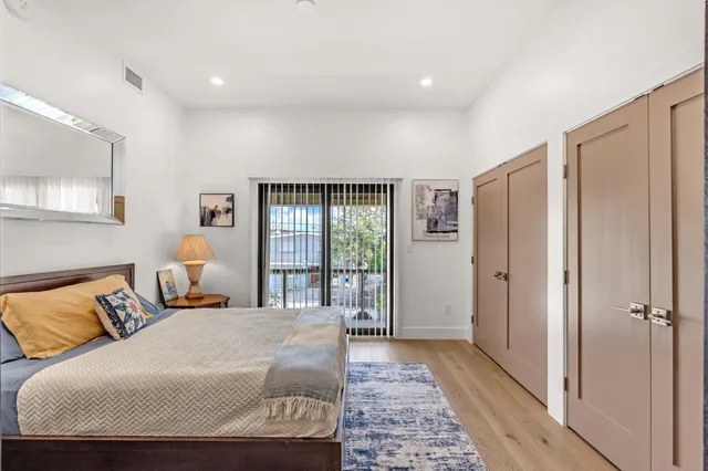 a view of a livingroom with furniture and a large window