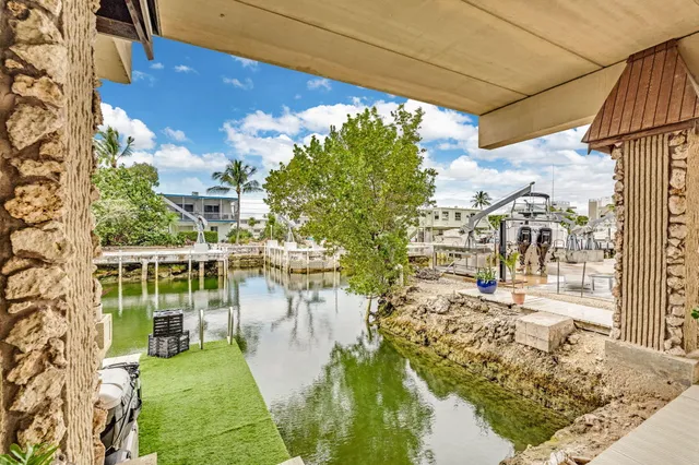 a view of yard with swimming pool and outdoor seating