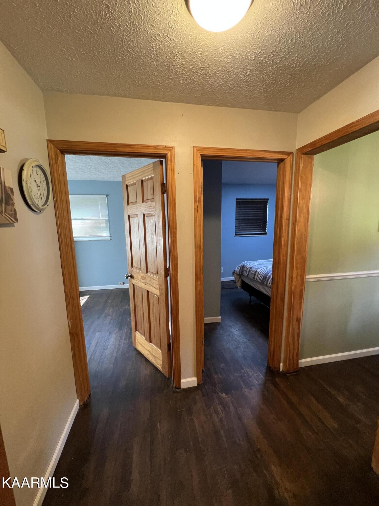 230 Granite Road Clinton, TN 37716 - Photo 11 of 15 a view of a hallway with wooden floor
