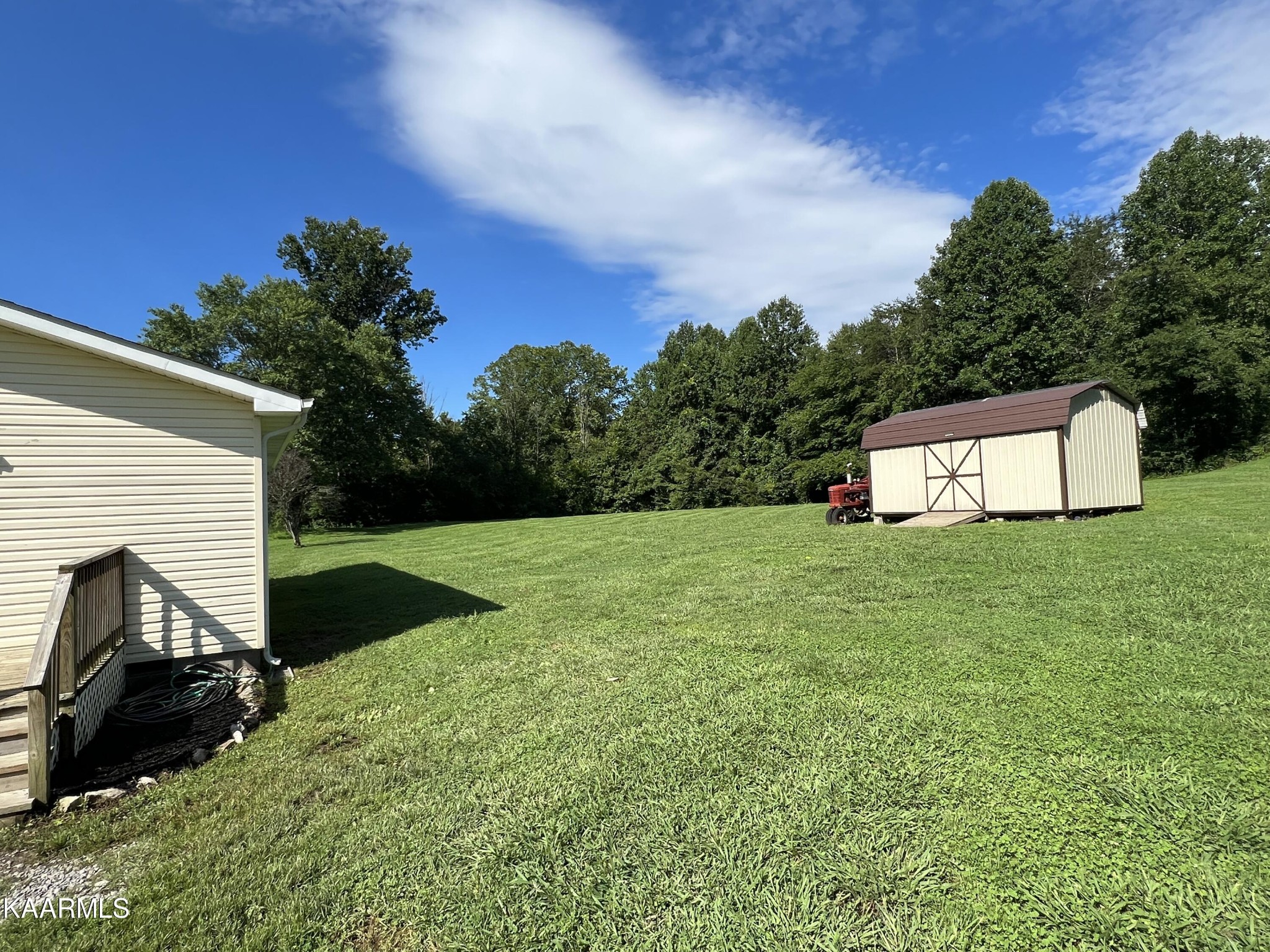 230 Granite Road Clinton, TN 37716 - Photo 3 of 15 a view of a back yard