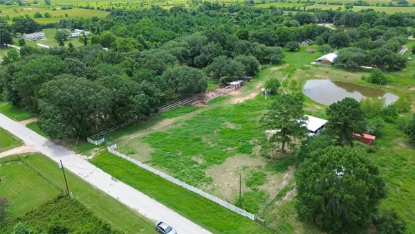a view of a garden with a lake