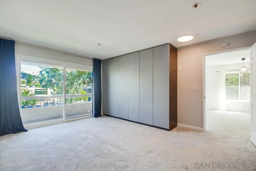 5645 Friars Road, Unit 363 San Diego, CA 92110 - Photo 22 of 74 a view of a livingroom with an empty space and window