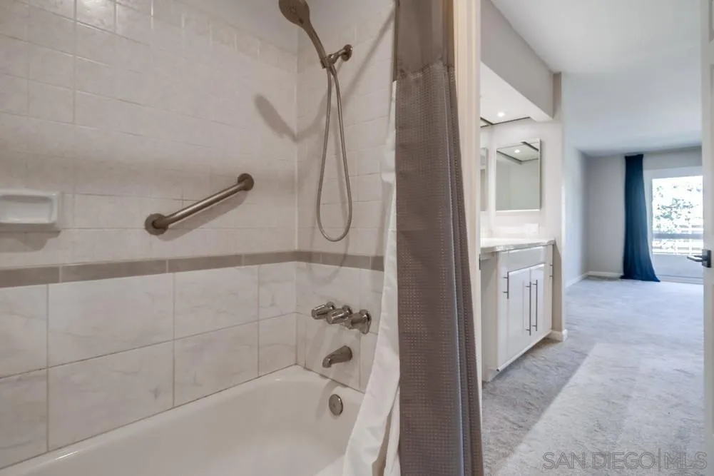 5645 Friars Road, Unit 363 San Diego, CA 92110 - Photo 34 of 74 a bathroom with a bathtub and shower