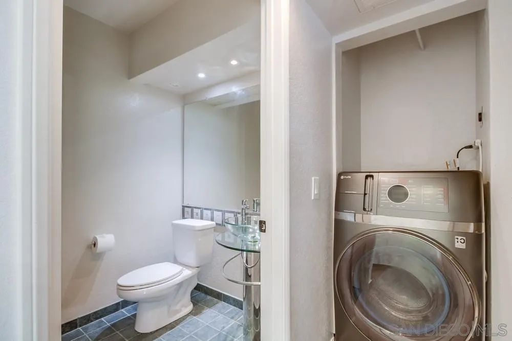 5645 Friars Road, Unit 363 San Diego, CA 92110 - Photo 37 of 74 a bathroom with a toilet and a sink