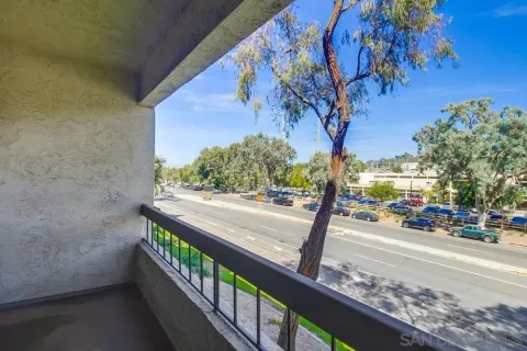 a view of a chairs and table in a patio