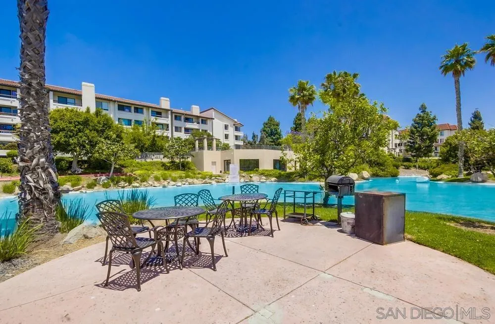 5645 Friars Road, Unit 363 San Diego, CA 92110 - Photo 63 of 74 a view of a chairs and table in a patio
