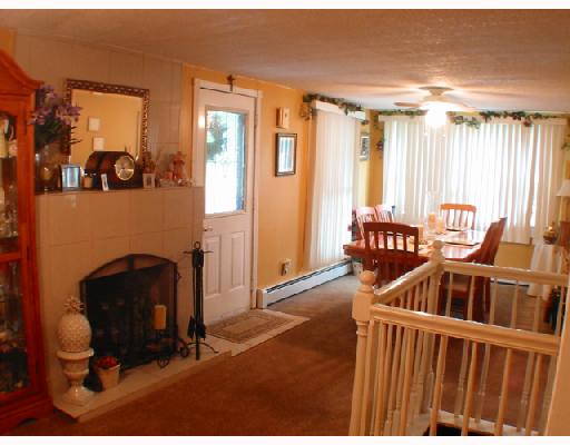99 Pulaski Road Burrillville, RI 02830 - Photo 5 of 8 Dining Room. Bright dining room has new carpet, plenty of natural light and it s own fireplace.