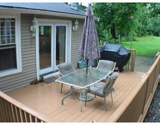 99 Pulaski Road Burrillville, RI 02830 - Photo 7 of 8 Patio/Deck. Extra-large deck is only a few years old and leads out to your level backyard.