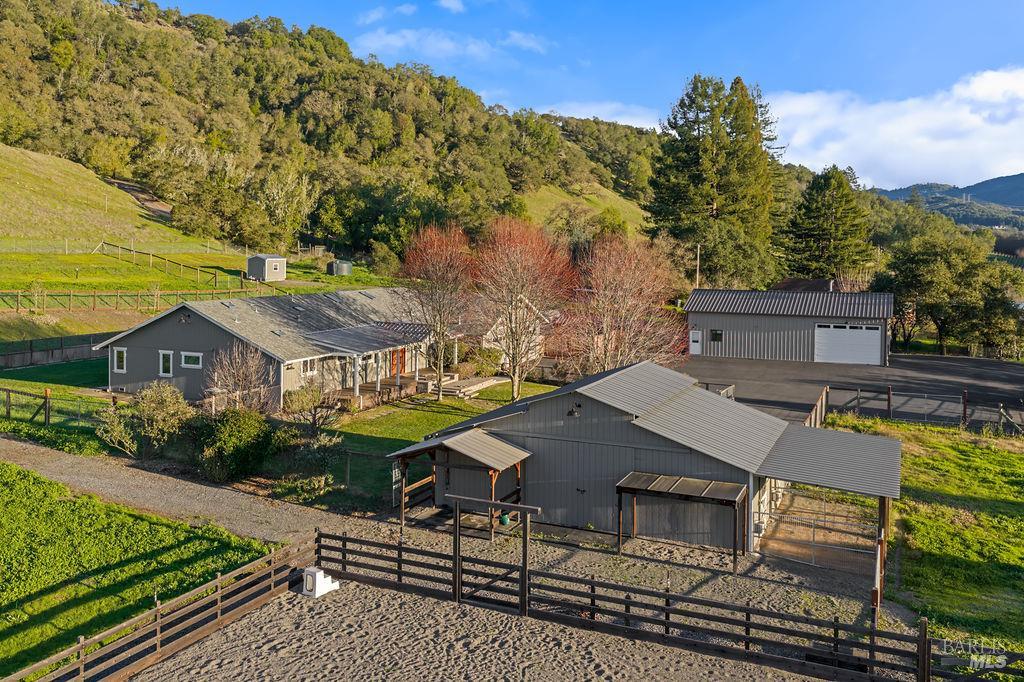 an aerial view of a house with a garden
