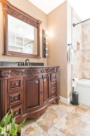 a view of a sink and a mirror