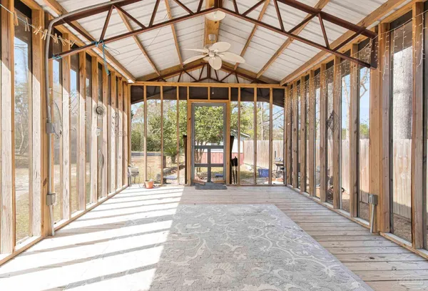 a view of a porch with a backyard